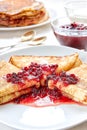 Healthy breakfast with fresh hot pancakes with berry jam