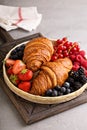 Healthy breakfast with freshly baked croissants and berries Royalty Free Stock Photo