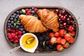 Healthy breakfast with freshly baked croissants and berries Royalty Free Stock Photo