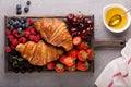 Healthy breakfast with freshly baked croissants and berries Royalty Free Stock Photo