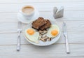 Healthy breakfast, fried eggs with mushrooms and two slices of r Royalty Free Stock Photo