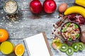 Healthy breakfast with fruit oatmeal and recipe book Royalty Free Stock Photo