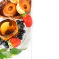 Healthy breakfast - fruit, tea and muffins Royalty Free Stock Photo