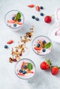 Healthy breakfast, fruit yogurt with berries and granola Royalty Free Stock Photo