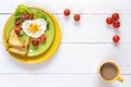 Healthy Breakfast with heart-shaped fried egg, toast, cherry tom Royalty Free Stock Photo