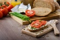 Healthy breakfast - homemade beer bread with cheese, tomatoes