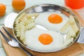 Fried eggs with french fries made from cream, apricot and fresh apple