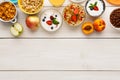 Healthy breakfast meals on wooden table copy space