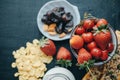 Healthy breakfast with milk, corn flakes, strawberries and cherries Royalty Free Stock Photo