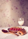 Healthy breakfast with milk and croissants. Fresh tasty berries.