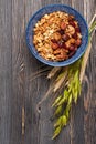 Healthy Breakfast. Muesli granola oatmeal with nuts, milk and dried fruits. Top view. Royalty Free Stock Photo