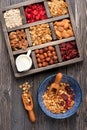 Healthy Breakfast. Muesli granola oatmeal with nuts, milk and dried fruits. Top view. Royalty Free Stock Photo