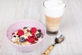 Healthy breakfast with muesli, milk, berries and coffee Royalty Free Stock Photo