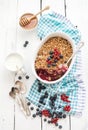 Healthy breakfast. Oat granola berry crumble with