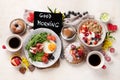 Healthy breakfast with oatmeal, berries, egg, bacon and a cup of coffee. Good morning Royalty Free Stock Photo