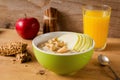 Healthy breakfast, oatmeal porridge with fruits, nuts and juice Royalty Free Stock Photo