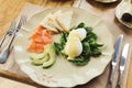 Healthy breakfast with poached eggs and smoked salm Royalty Free Stock Photo