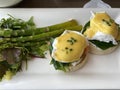 Healthy breakfast poached eggs with smoked salmon, spinach and asparagus Royalty Free Stock Photo