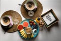 Healthy breakfast with porridge, fruit, cut grapefruit and orange juice on white table surrounded by an elegant environment