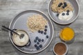 Healthy breakfast. Porridge oats with blueberries fruit and yoghurt flatlay Royalty Free Stock Photo