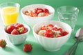 Healthy breakfast quinoa with strawberry banana coconut flakes