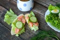 Healthy breakfast, sandwiches coffee salad eggs on dark wooden background. Plate food green vegetarian Royalty Free Stock Photo