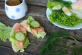 Healthy breakfast, sandwiches coffee salad eggs on dark wooden background. Plate food green vegetarian Royalty Free Stock Photo