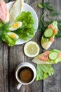 Healthy breakfast, sandwiches coffee salad eggs on dark wooden background. Plate food green vegetarian Royalty Free Stock Photo