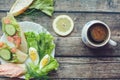 Healthy breakfast, sandwiches coffee salad eggs on dark wooden background. Plate food green vegetarian Royalty Free Stock Photo