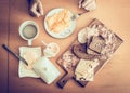 Healthy breakfast, scrambled eggs, black coffee, sandwiches with salami cheese , on a wooden table, top view Royalty Free Stock Photo