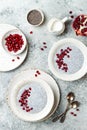 Healthy breakfast set. Chia seed pudding bowls with pomegranate Royalty Free Stock Photo