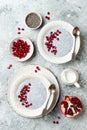 Healthy breakfast set. Chia seed pudding bowls with pomegranate Royalty Free Stock Photo