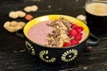 Healthy breakfast. Smoothie bowl with frozen fruits, greek yogurt and cereals Royalty Free Stock Photo