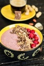 Healthy breakfast. Smoothie bowl with frozen fruits, greek yogurt and cereals Royalty Free Stock Photo