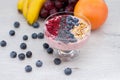 Healthy breakfast smoothie bowl on table and fresh fruits Royalty Free Stock Photo