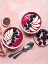 Healthy breakfast smoothie bowls with nectarines, blackberries, coconut flakes and chia seeds