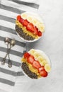 Healthy breakfast of smoothie with chia, coco, strawberry, nuts Royalty Free Stock Photo