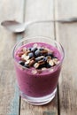 Healthy breakfast of smoothie, dessert, yogurt or milkshake with frozen berry and oats decorated grated chocolate Royalty Free Stock Photo