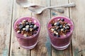 Healthy breakfast of smoothie, dessert, yogurt or milkshake with frozen berry and oats decorated grated chocolate Royalty Free Stock Photo