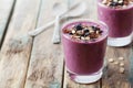 Healthy breakfast of smoothie, dessert, yogurt or milkshake with frozen berry and oats decorated grated chocolate Royalty Free Stock Photo