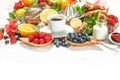 Healthy breakfast table with coffee, croissants, muesli, fresh b