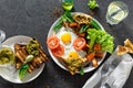 Healthy breakfast table concept. Breakfast table. Fried eggs with vegetables