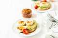 Healthy breakfast: toasts with avocado slices, tomato, paprika and eggs Royalty Free Stock Photo