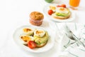 Healthy breakfast: toasts with avocado slices, tomato, paprika and eggs Royalty Free Stock Photo