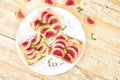 Healthy breakfast toasts from sliced watermelon radish Royalty Free Stock Photo