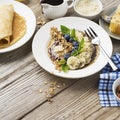 Healthy breakfast trend. Thin oat pancakes with banana, blueberries, goji berries, sesame and chia seeds