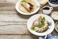 Healthy breakfast trend. Thin oat pancakes with banana, blueberries, goji berries, sesame and chia seeds