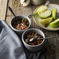 Healthy breakfast.Two bowls of muesli with oats, nuts and dried fruits - apples, resins, pumpkin seeds and almonds on wooden table