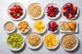 Healthy breakfast. Vibrant photo of table full of fresh fruit, oatmeal and healthy croissants. Balanced diet. Royalty Free Stock Photo