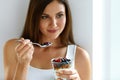 Healthy Breakfast. Woman With Glass Of Yogurt, Berries And Oats Royalty Free Stock Photo